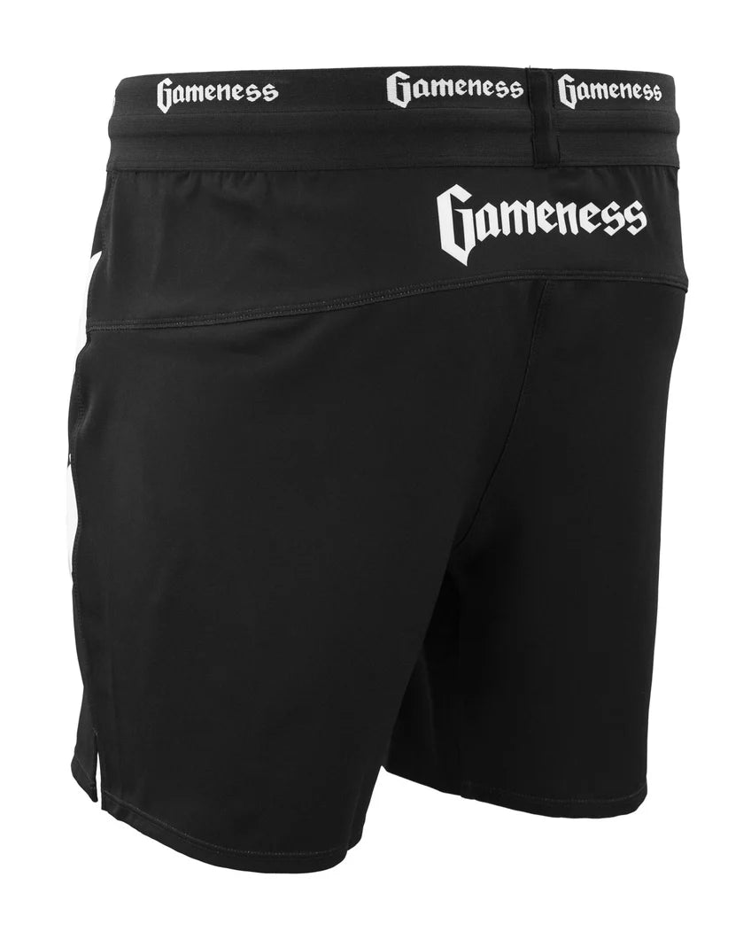 Black shorts with 'Gameness' branding on a white background