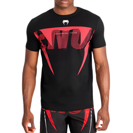 Person wearing a black and red sports outfit with a logo on a white background