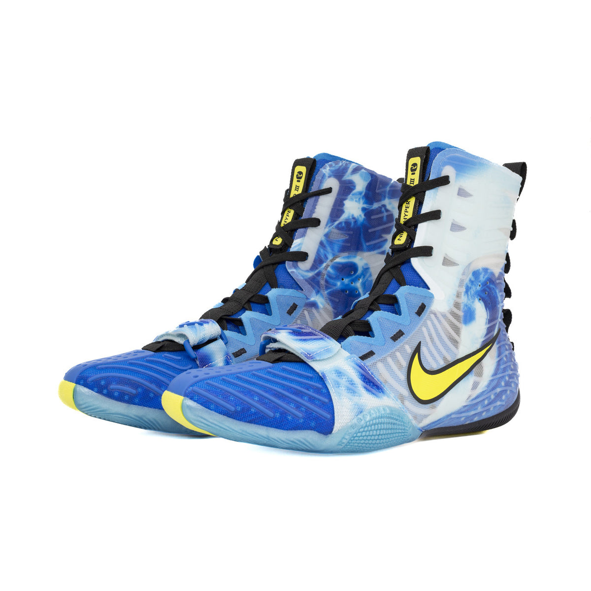 Blue and white athletic shoes with a yellow Nike logo on a white background