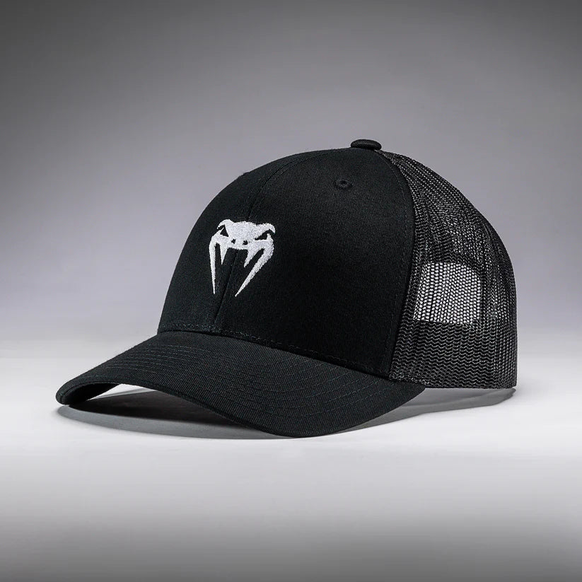 Black cap with a logo on a gray background
