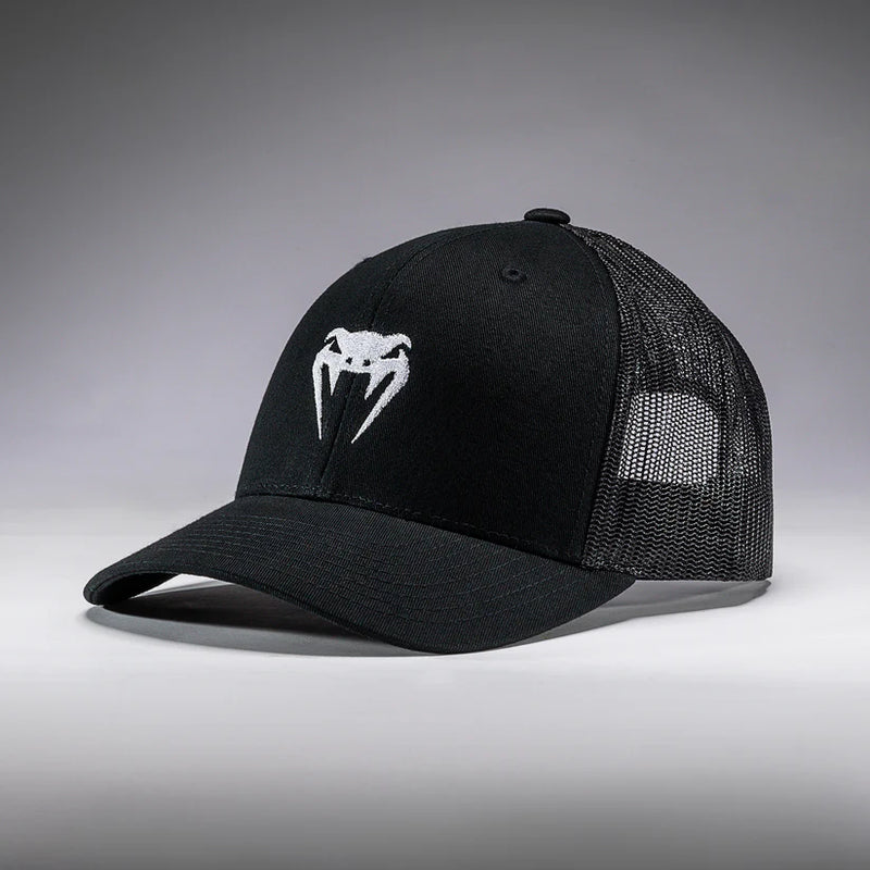 Black cap with a logo on a gray background