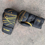 Guantes Victory de boxeo negro con dorado