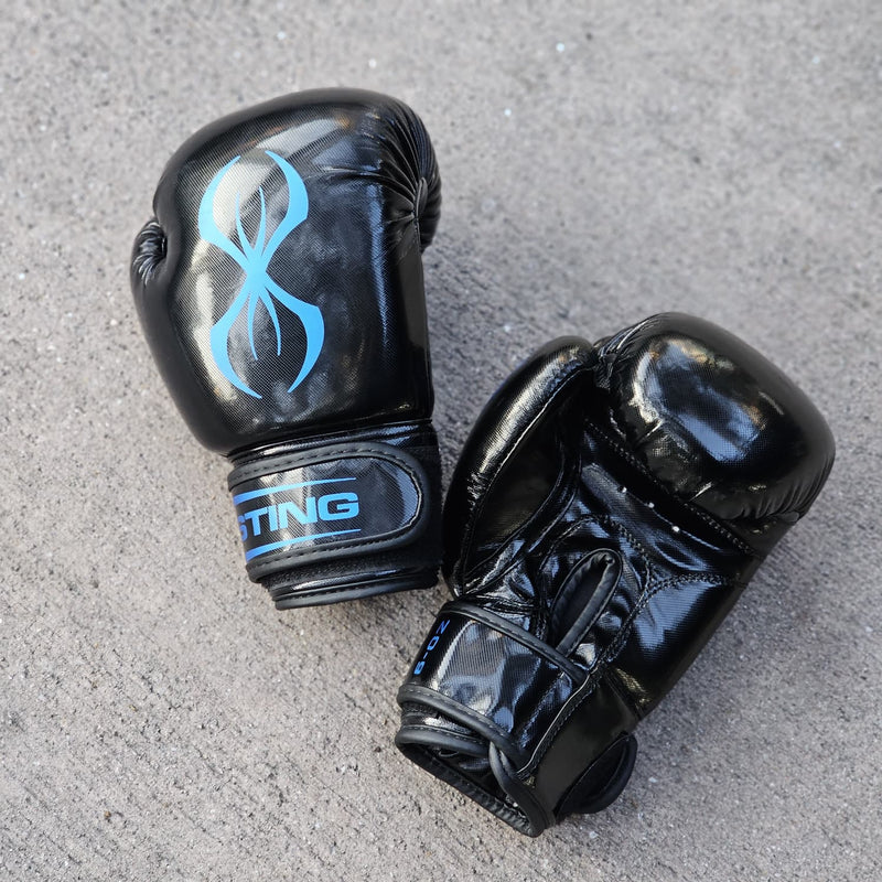 STING BOXING GLOVES ARMA JUNIOR BLACK/BLUE 6OZ