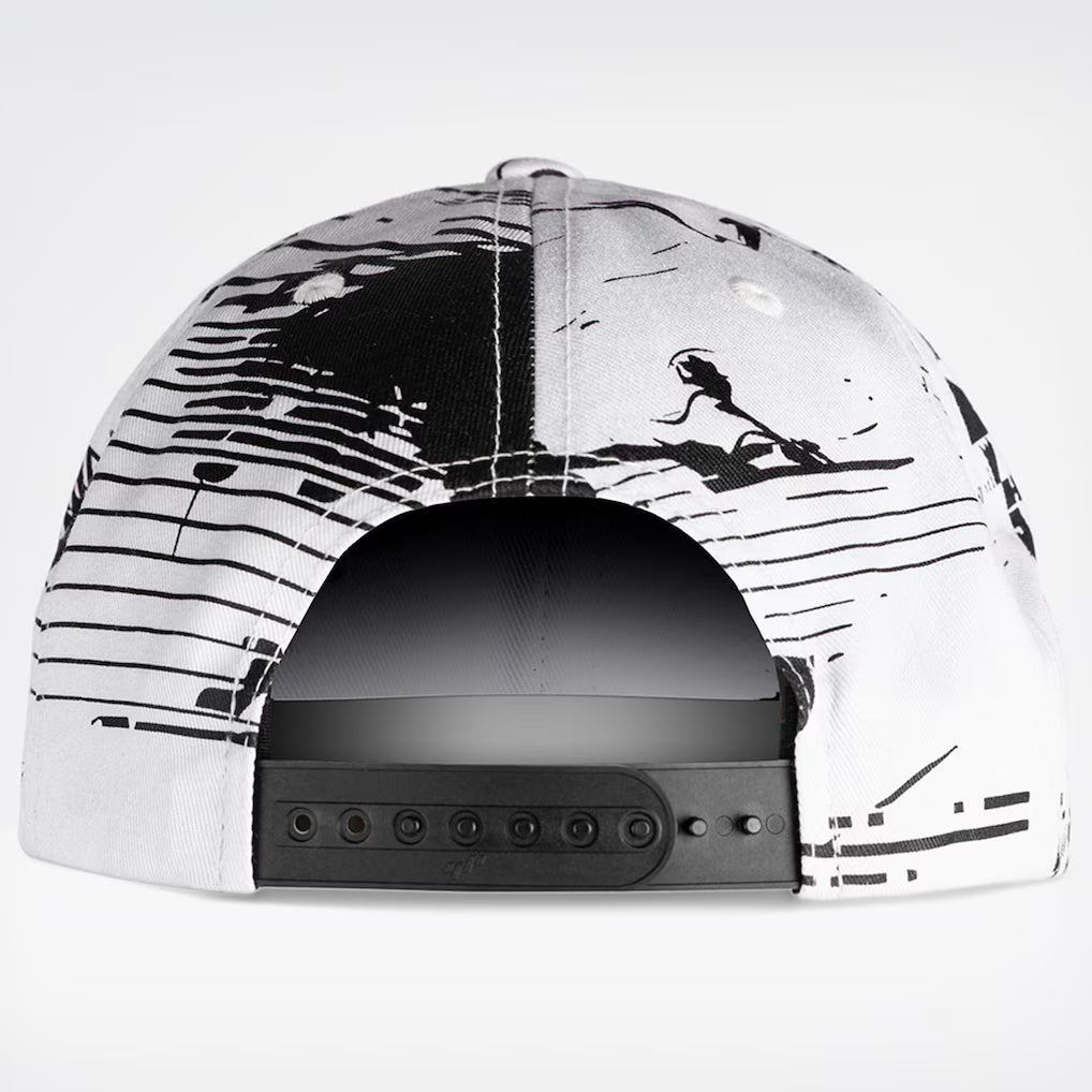 Black and white cap with abstract design on a white background