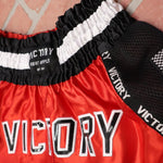 SHORTS DE VICTORY ROJO, NEGRO CON BLANCO